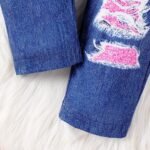 ⁦طقم بناتي قطعتين - بنطال جينز و تيشيرت برسمة فتاة⁩ - الصورة ⁦6⁩